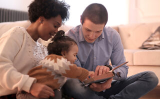 11.28.23 family Reading To Child