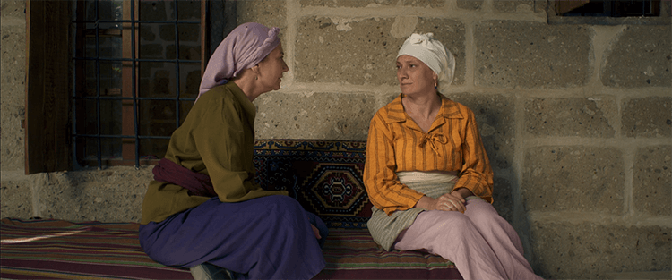 Two mothers sitting together