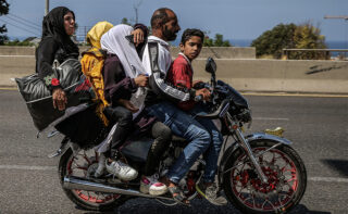 Rmeileh, Lebanon. 24th Sep, 2024. A Syrian Refugee Family Drives On Motorcycle Along Sidon Beirut, As They Flee From Rmeileh In South Lebanon To Beirut. Thousands Of Families Fled Southern Lebanon For Areas In The Capital Beirut And Mount Lebanon, Followi